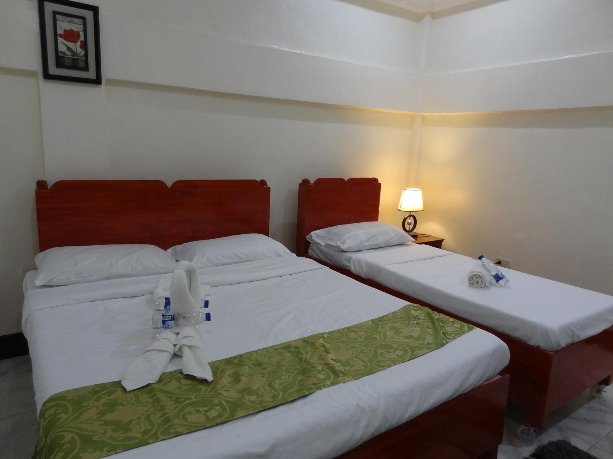 The Executive Villa Inn & Suites Davao Номер фото