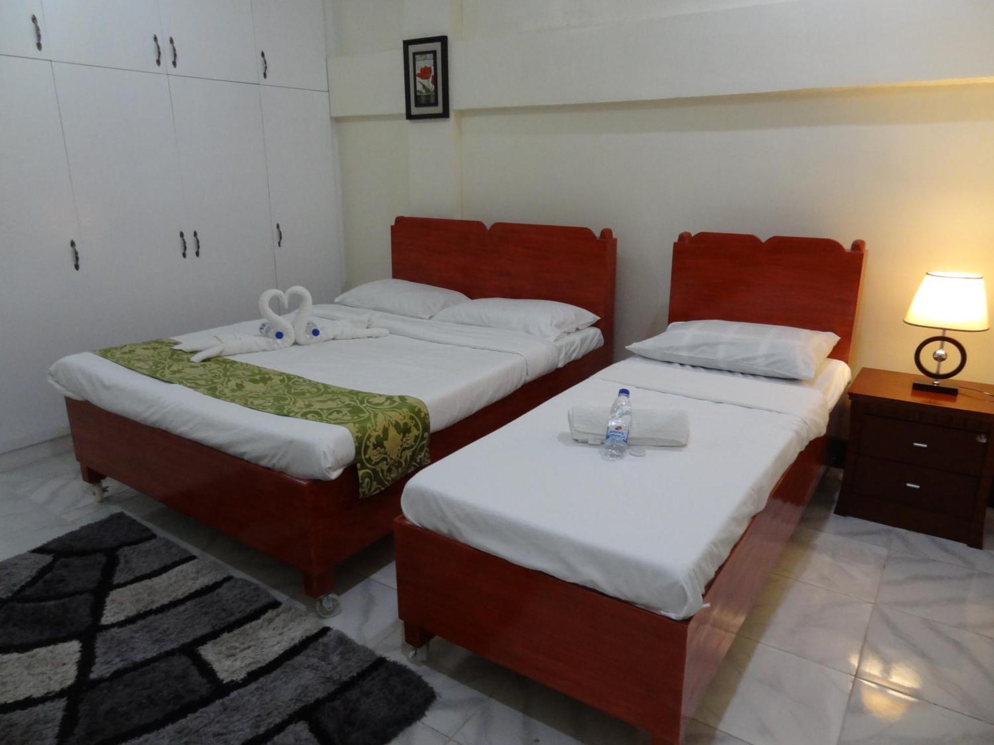 The Executive Villa Inn & Suites Davao Номер фото